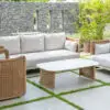 outdoor sofa and chairs in a neutral beige wicker